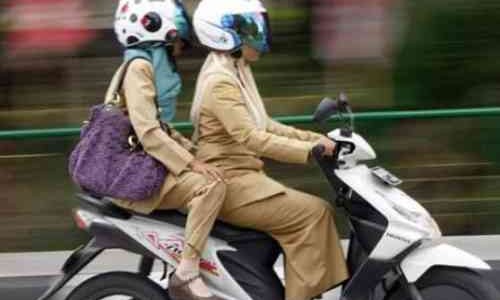 Tips aman naik Motor Untuk Wanita Berhijab